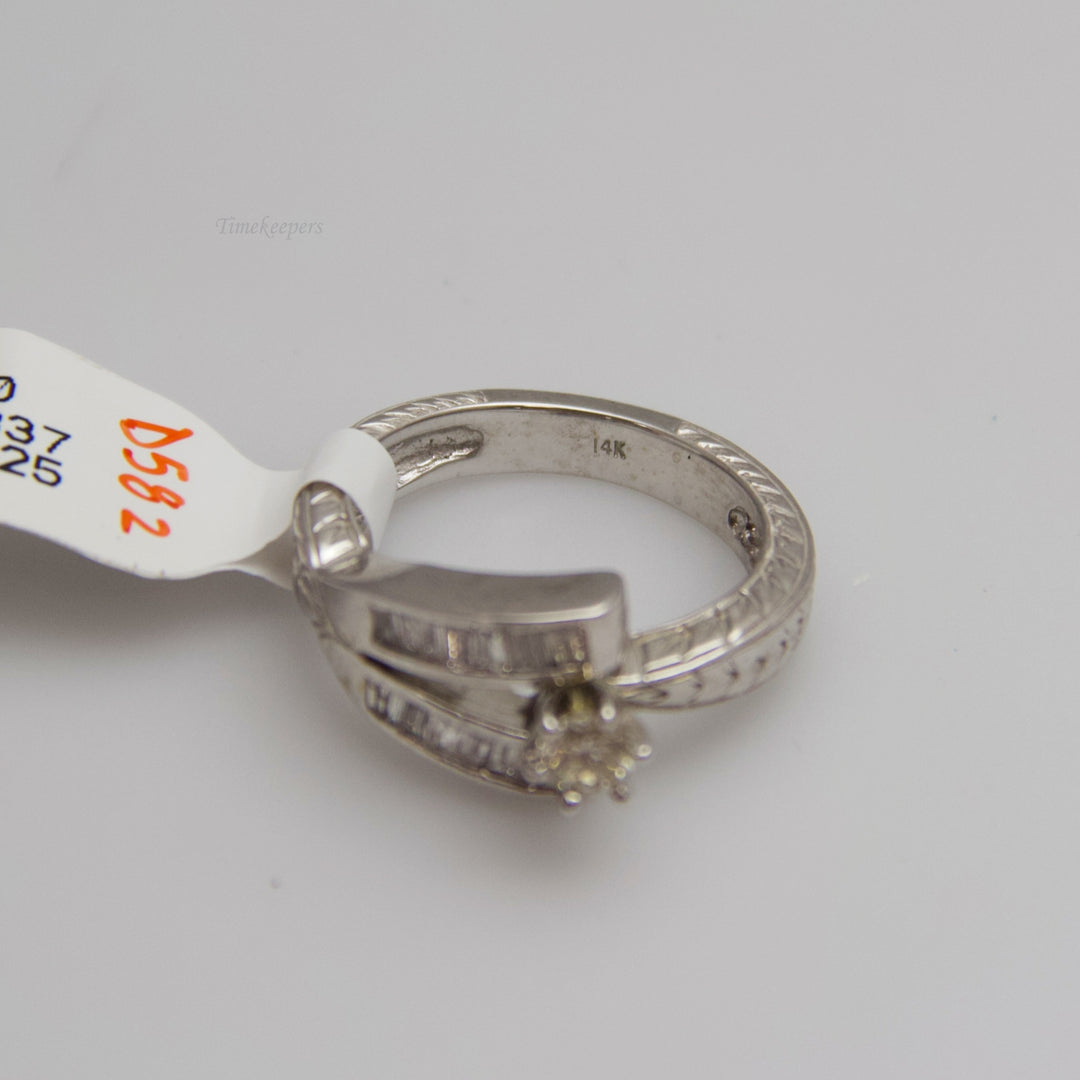 d582 Uniquely Shaped 14kt White Gold Diamond Engagement Ring