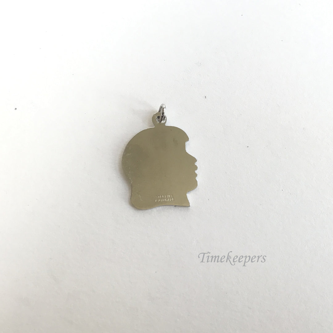 e210 Vintage Sterling Silver Image of a Girl Charm Pendant