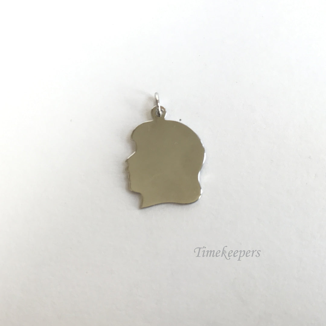 e210 Vintage Sterling Silver Image of a Girl Charm Pendant