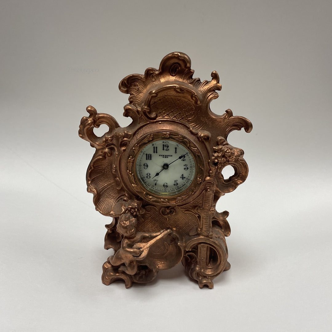 f460 Antique New Haven USA Mantel Standing Clock Carved Cupid