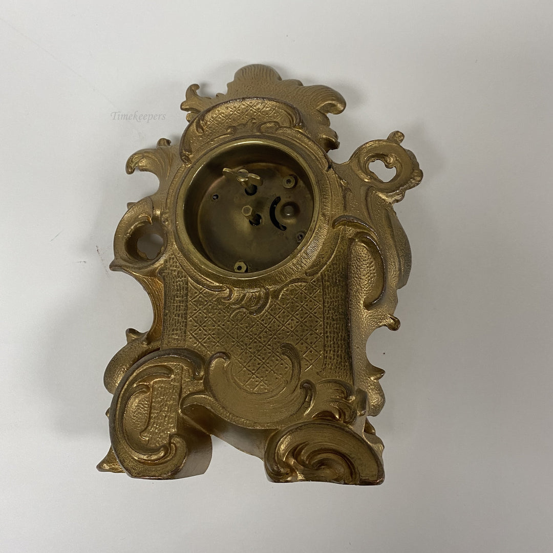 f461 Antique New Haven USA Mantel Standing Clock Carved Cupid