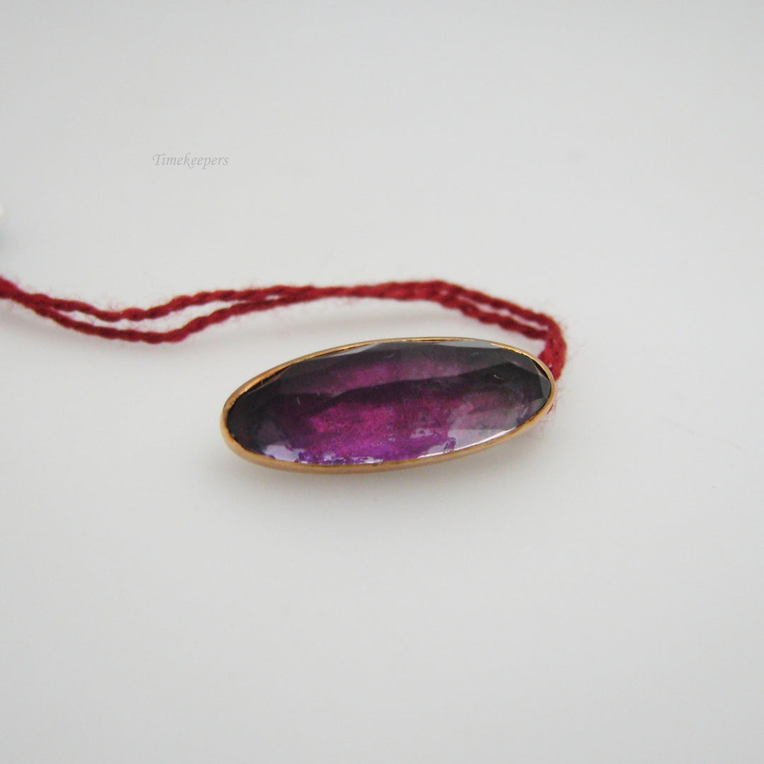 g015 Regal 14k Yellow Gold Purple Stone Pendant
