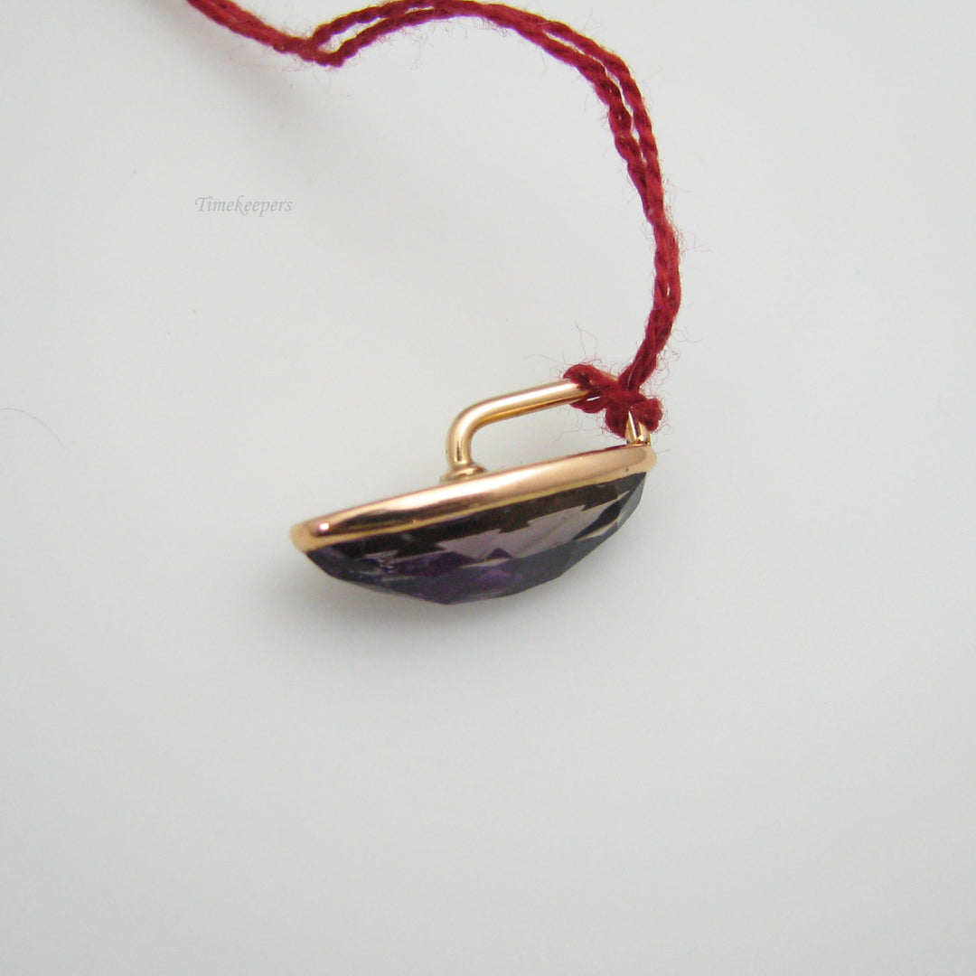 g015 Regal 14k Yellow Gold Purple Stone Pendant