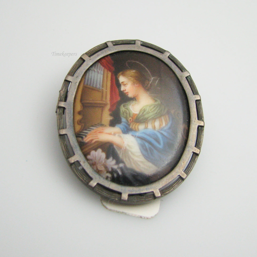 g044 Silver Saint Cecilia Brooch / Pin