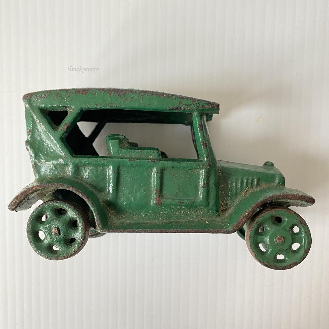 m105 Vintage Collectible Figurine Cast Iron Car Green Paint Rolling Wheels