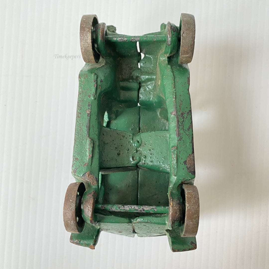m105 Vintage Collectible Figurine Cast Iron Car Green Paint Rolling Wheels