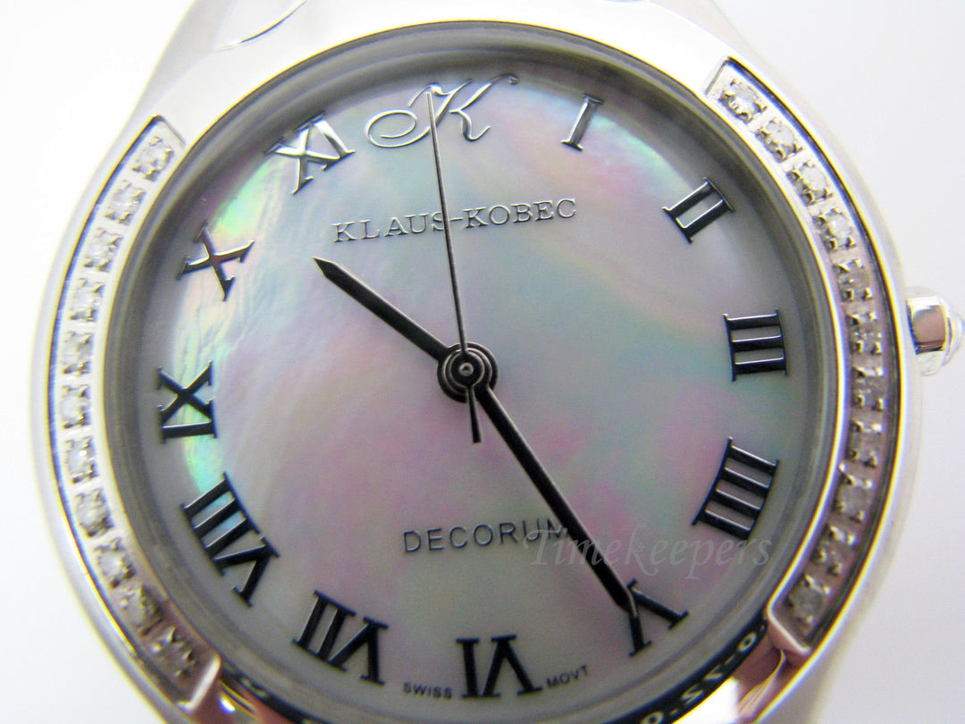 c620 Elegant and Handsome Klaus Kobec Quartz Timepiece with Mother of Pearl Dial