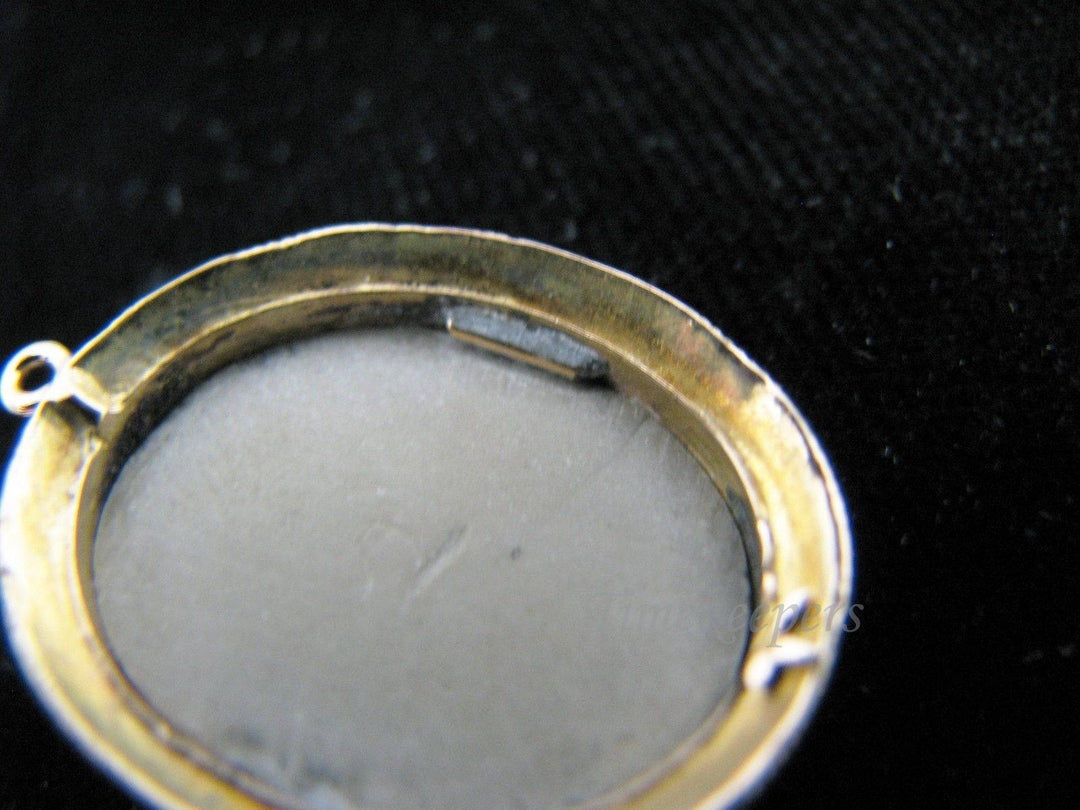 c496 Unique Cameo Pendant in Lava with a 14k Yellow Gold Decorative Bezel