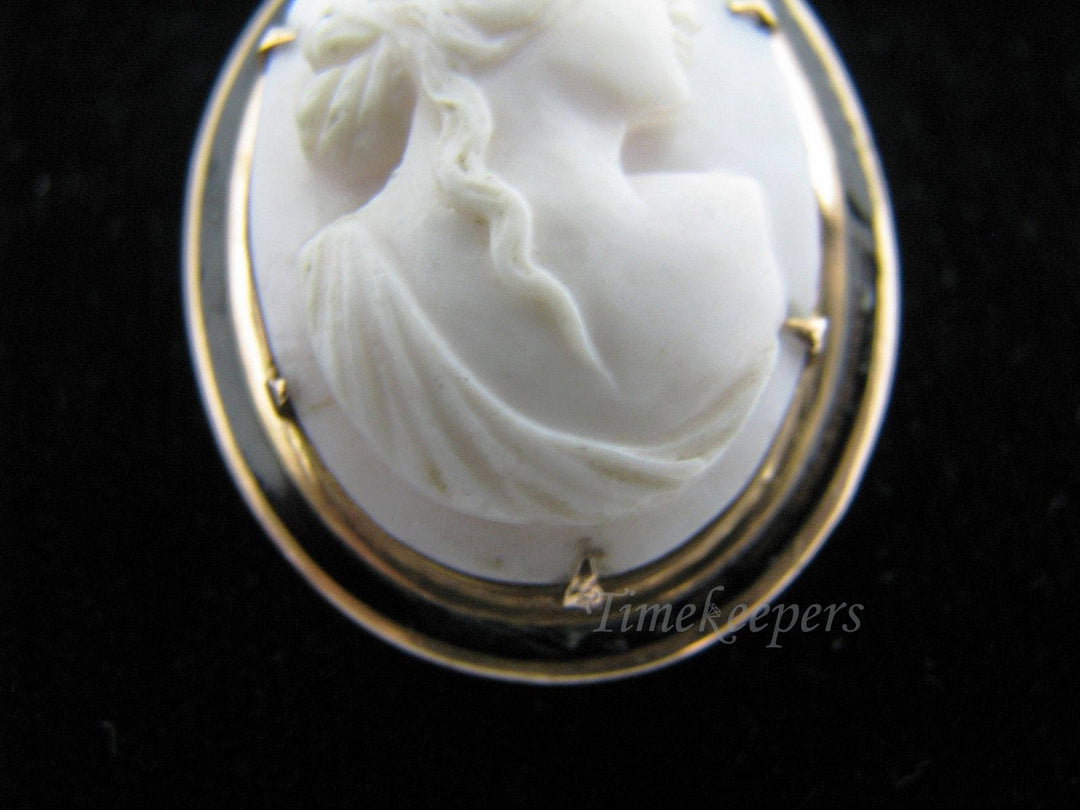 c513 Vintage White Cameo Brooch/ Pendant in 10k Yellow Gold with Black Enamel Frame