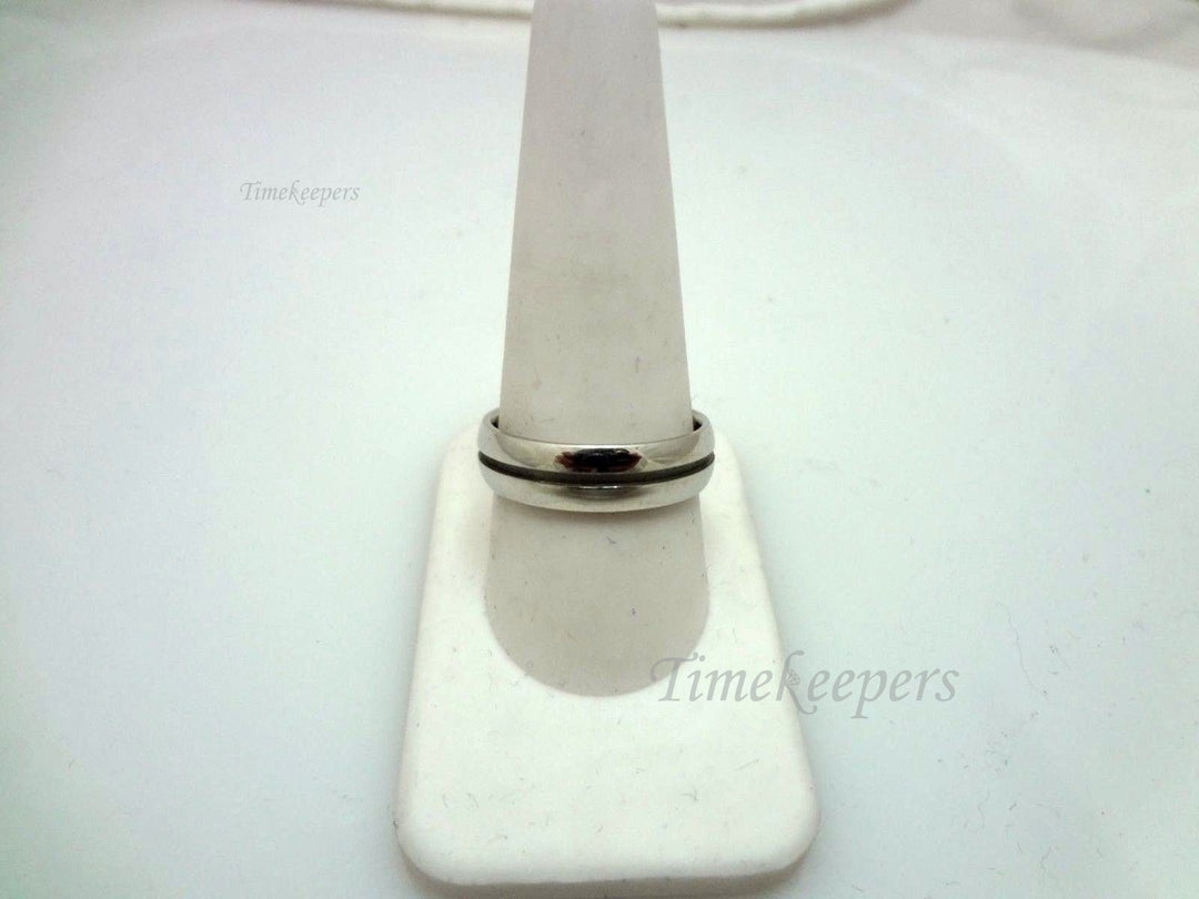 a891 Handsome Jeff Cooper Platinum Wedding Band with Reveal around Center