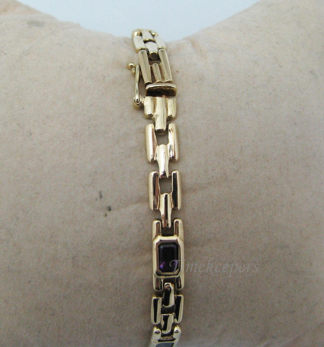 a401 14k Yellow Gold Bracelet with Emerald Cut Gemstones