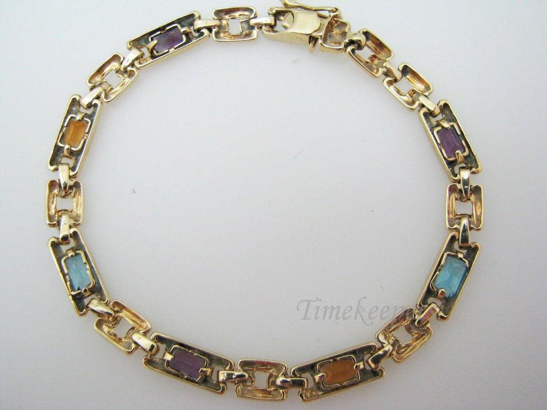 a401 14k Yellow Gold Bracelet with Emerald Cut Gemstones