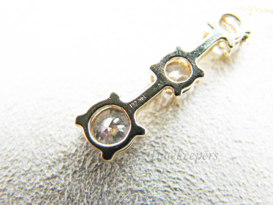 c604 Gorgeous Graduated Three Diamond Necklace in 14k Yellow Gold .85 TCW