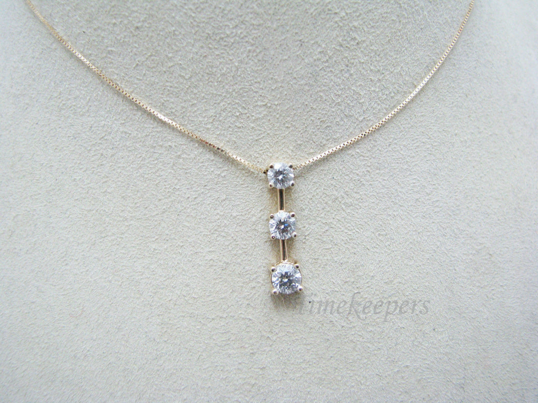 c604 Gorgeous Graduated Three Diamond Necklace in 14k Yellow Gold .85 TCW