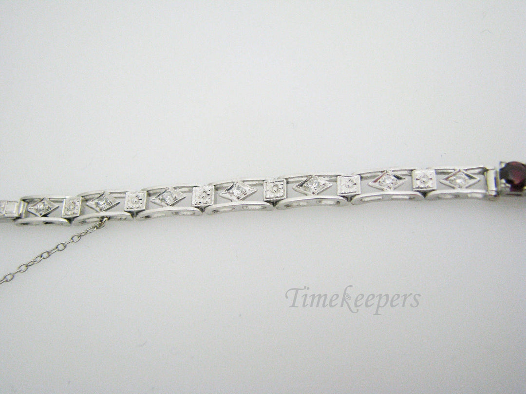 a896 Vintage Exquisite Platinum Bracelet with Diamond Chips and Red Stones