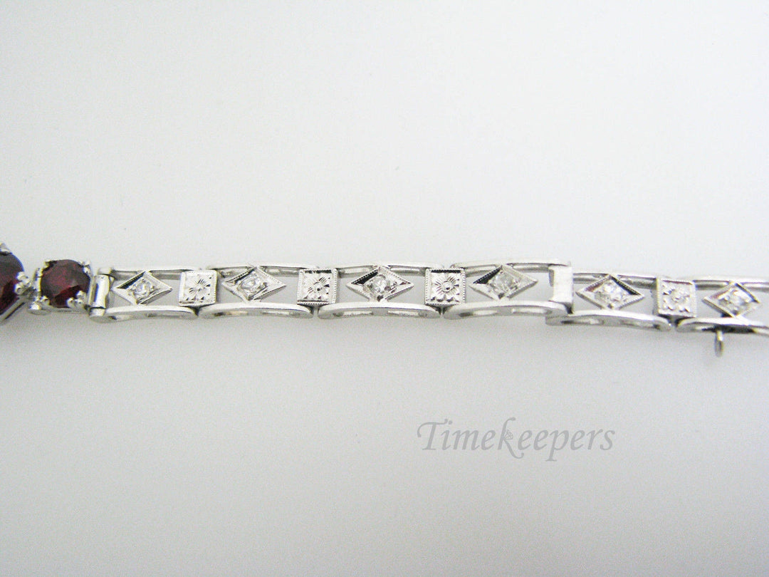 a896 Vintage Exquisite Platinum Bracelet with Diamond Chips and Red Stones