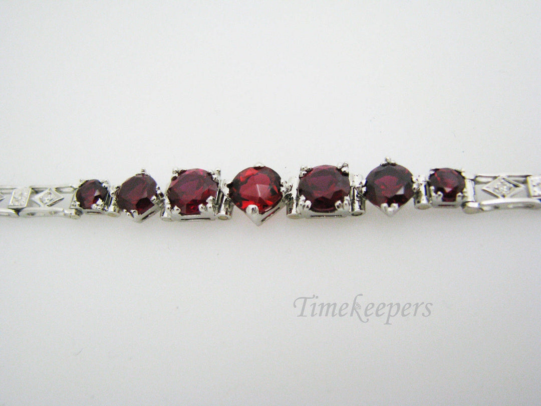 a896 Vintage Exquisite Platinum Bracelet with Diamond Chips and Red Stones