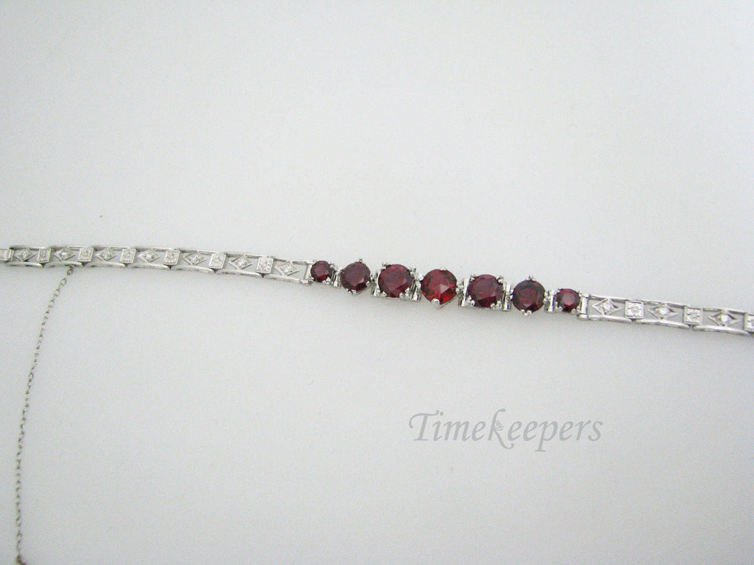 a896 Vintage Exquisite Platinum Bracelet with Diamond Chips and Red Stones
