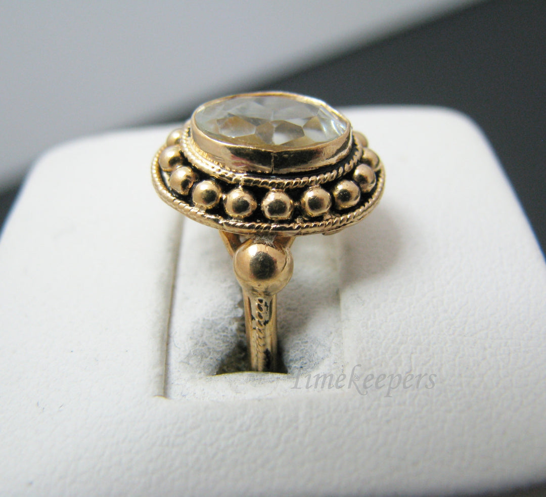 c039 Pretty Vintage 18k Yellow Gold ring with a Large Very Light Blue Bezel Set Stone
