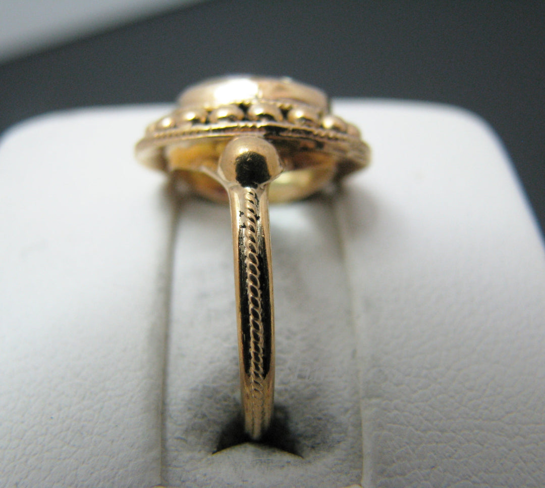 c039 Pretty Vintage 18k Yellow Gold ring with a Large Very Light Blue Bezel Set Stone