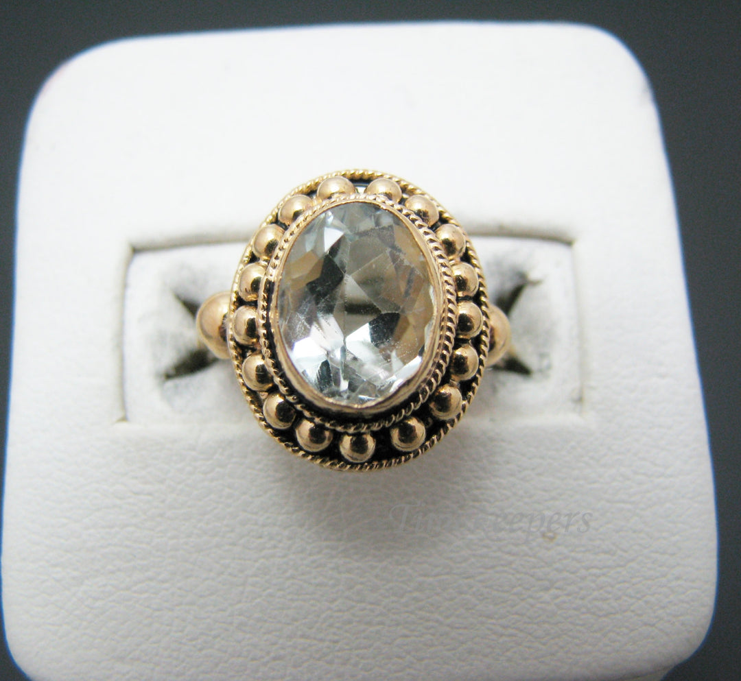 c039 Pretty Vintage 18k Yellow Gold ring with a Large Very Light Blue Bezel Set Stone