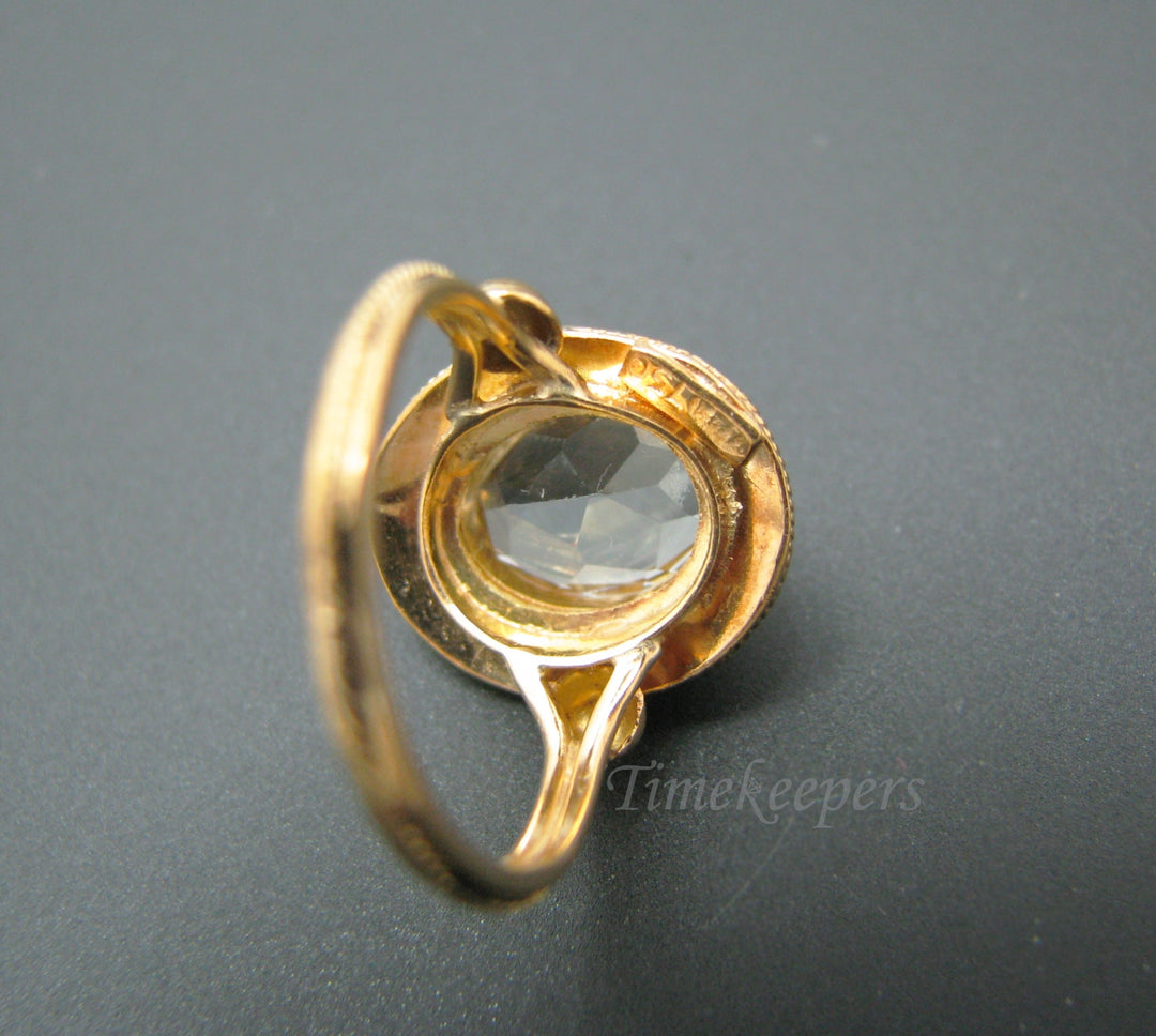 c039 Pretty Vintage 18k Yellow Gold ring with a Large Very Light Blue Bezel Set Stone
