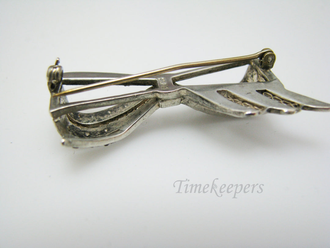 a913 Unique Vintage Bow Brooch in Sterling Silver with Blue & White Stones