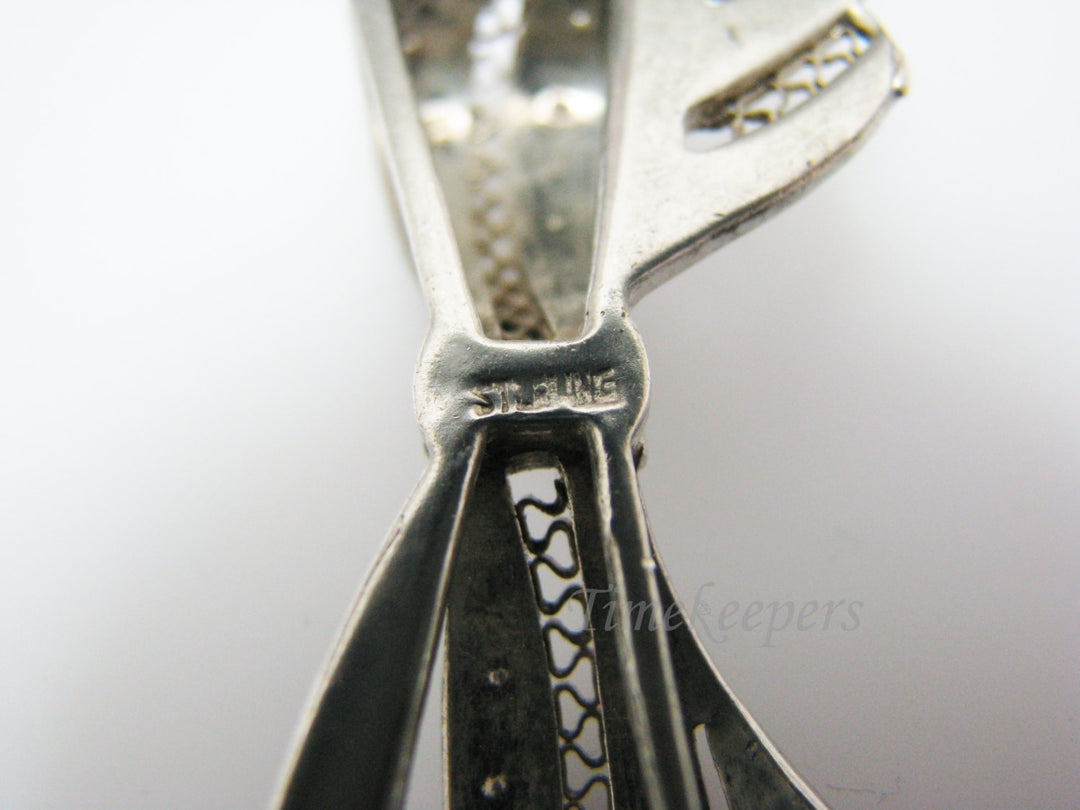 a913 Unique Vintage Bow Brooch in Sterling Silver with Blue & White Stones