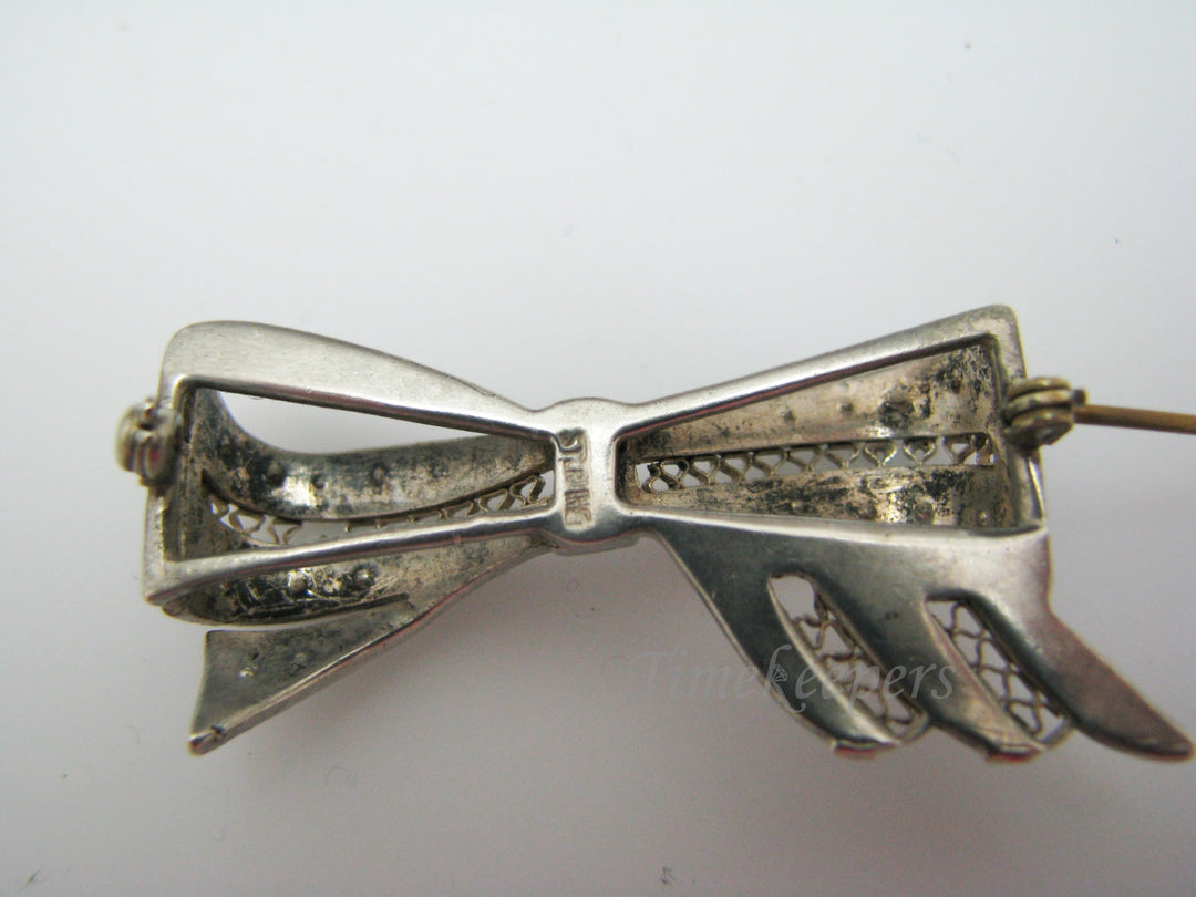 a913 Unique Vintage Bow Brooch in Sterling Silver with Blue & White Stones
