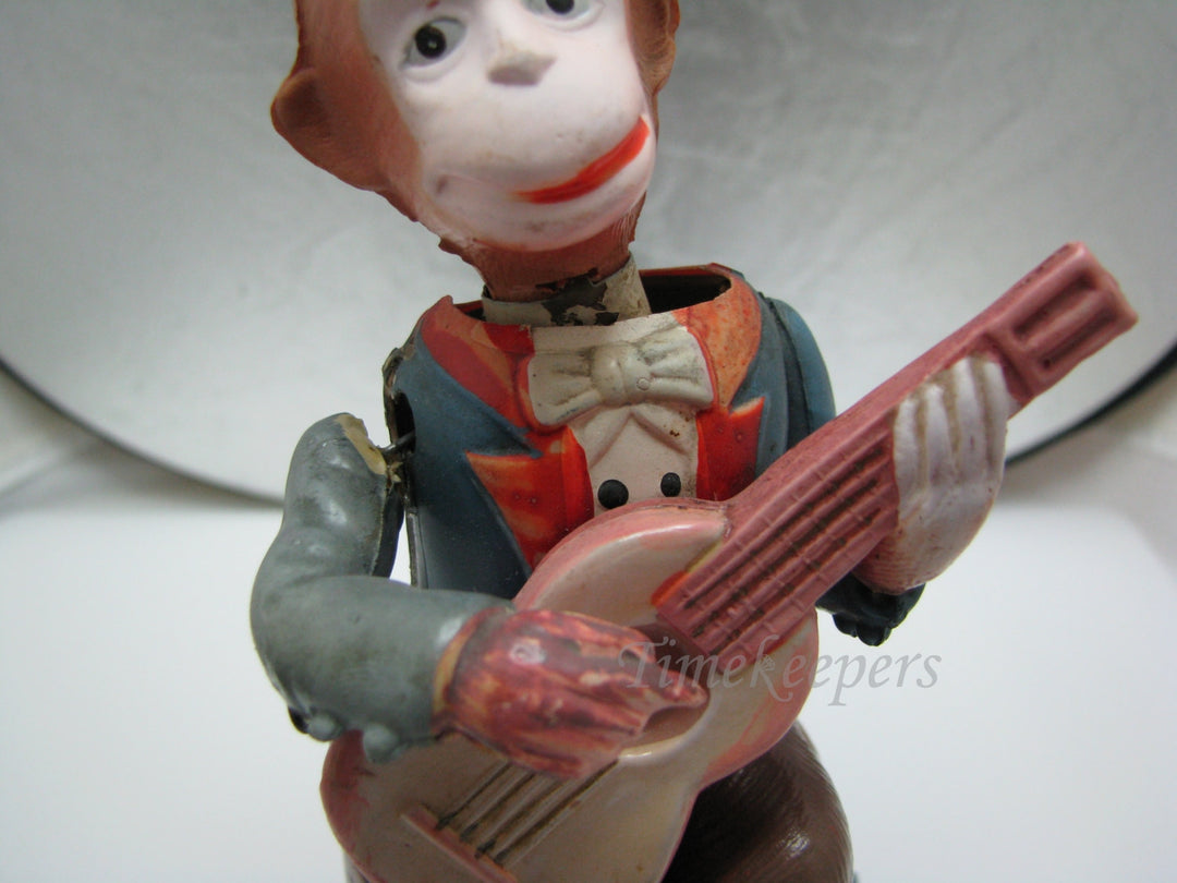 c612 Fun Vintage Guitar Playing Wind UP Monkey