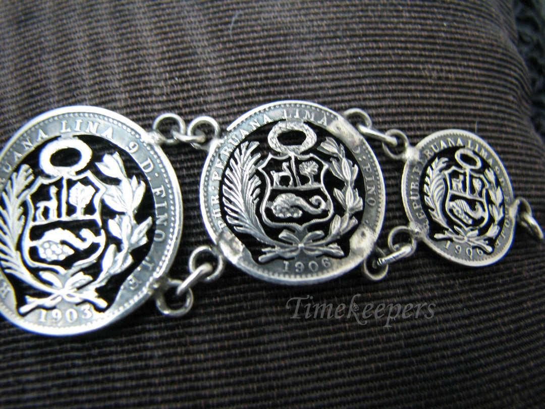 j147 Lovely Peru Cut Out Graduated Coin Bracelet