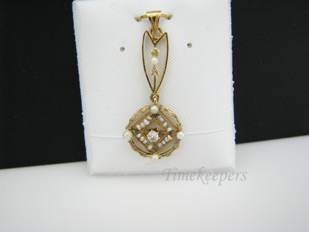 a826 Beautiful Vintage Pearl and Diamond Pendant in 10k Yellow gold