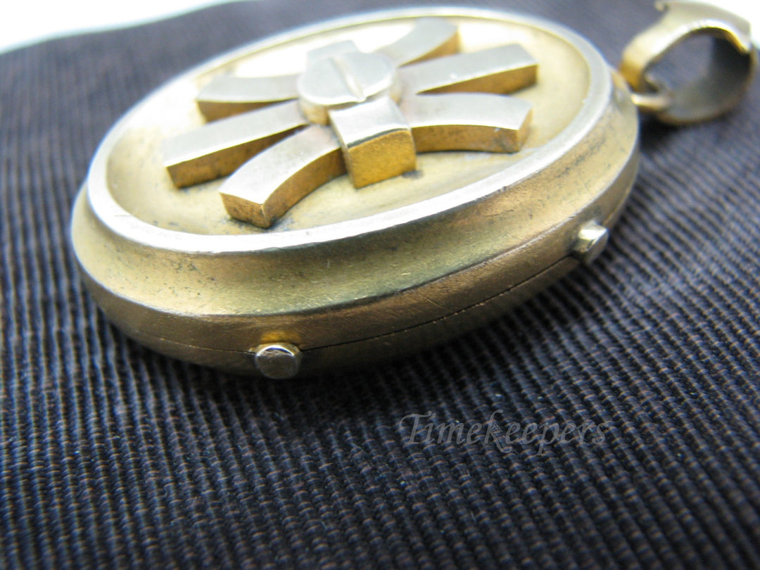 a727 Vintage Gold Filled Locket with Two places for Photos Inside