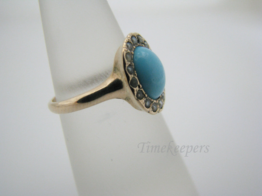 a1089 Vintage Ring w/ Oval Turquoise Stone surrounded by Seed Pearls in 10k YG