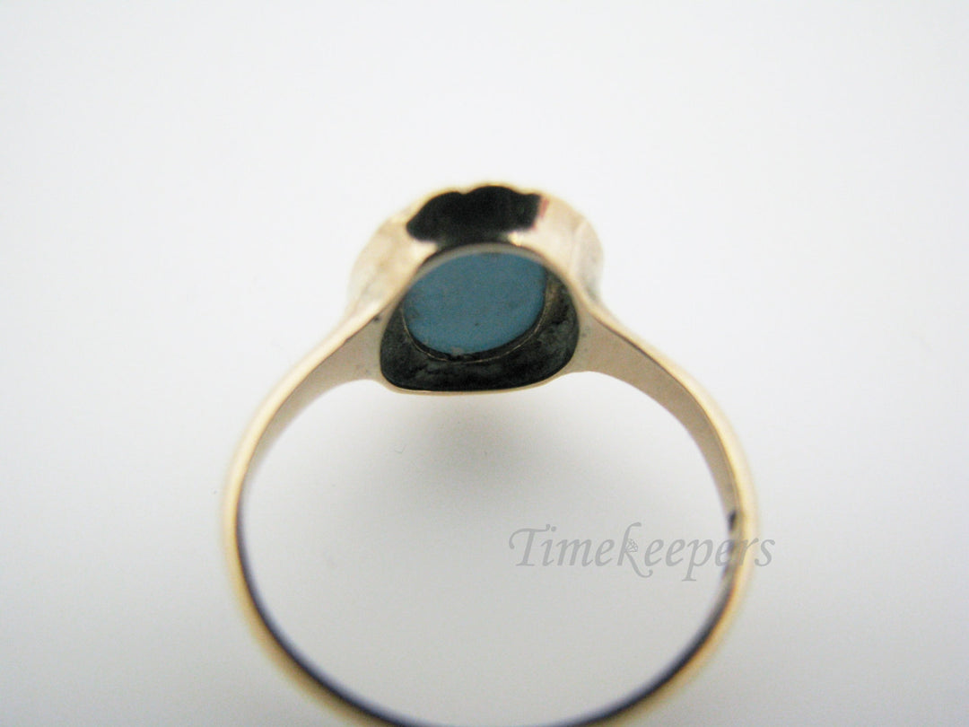 a1089 Vintage Ring w/ Oval Turquoise Stone surrounded by Seed Pearls in 10k YG
