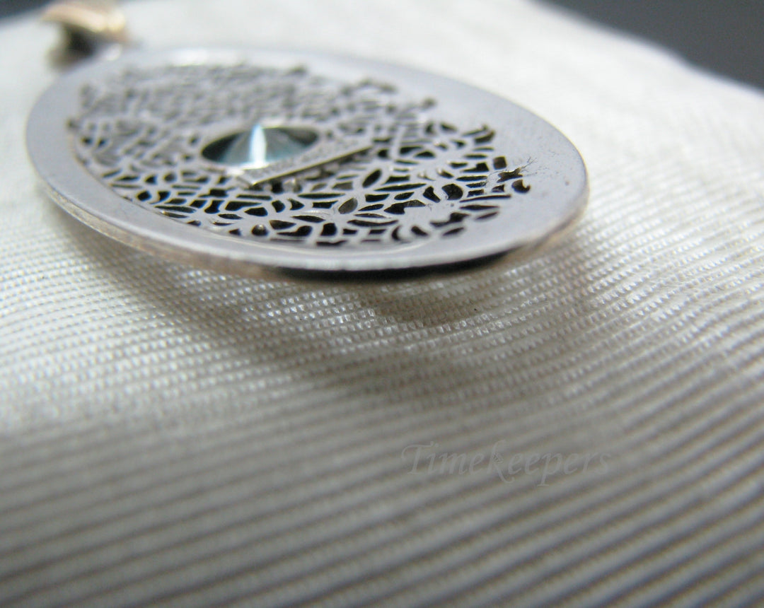 c510 Stunning Symmetalic Large Oval Floral Pendant with Center Blue Zircon