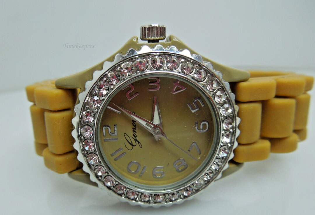 t050 Geneva Analog Wristwatch Beige Buckle Band Silver Tone Rhinestones  