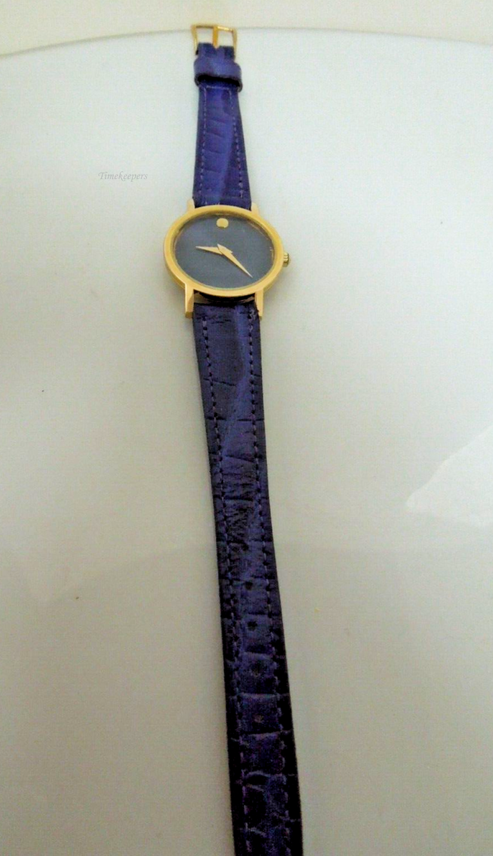 t032 Movado 87.A1.832 Ladies Swiss Quartz Gold Filled Blue Dial Watch