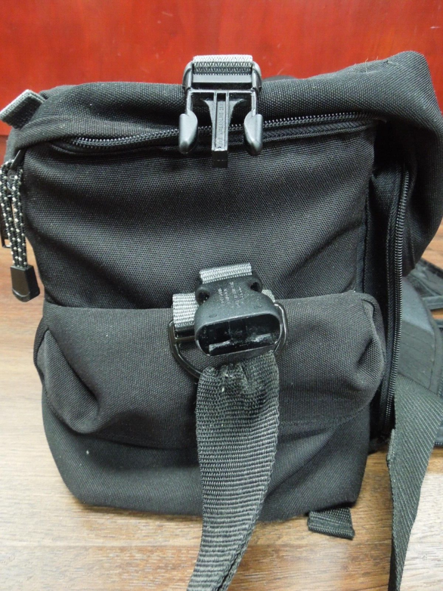 s656 Camera Bag from TAMRAC  Pro 12 "holds two DSLRs with lenses"