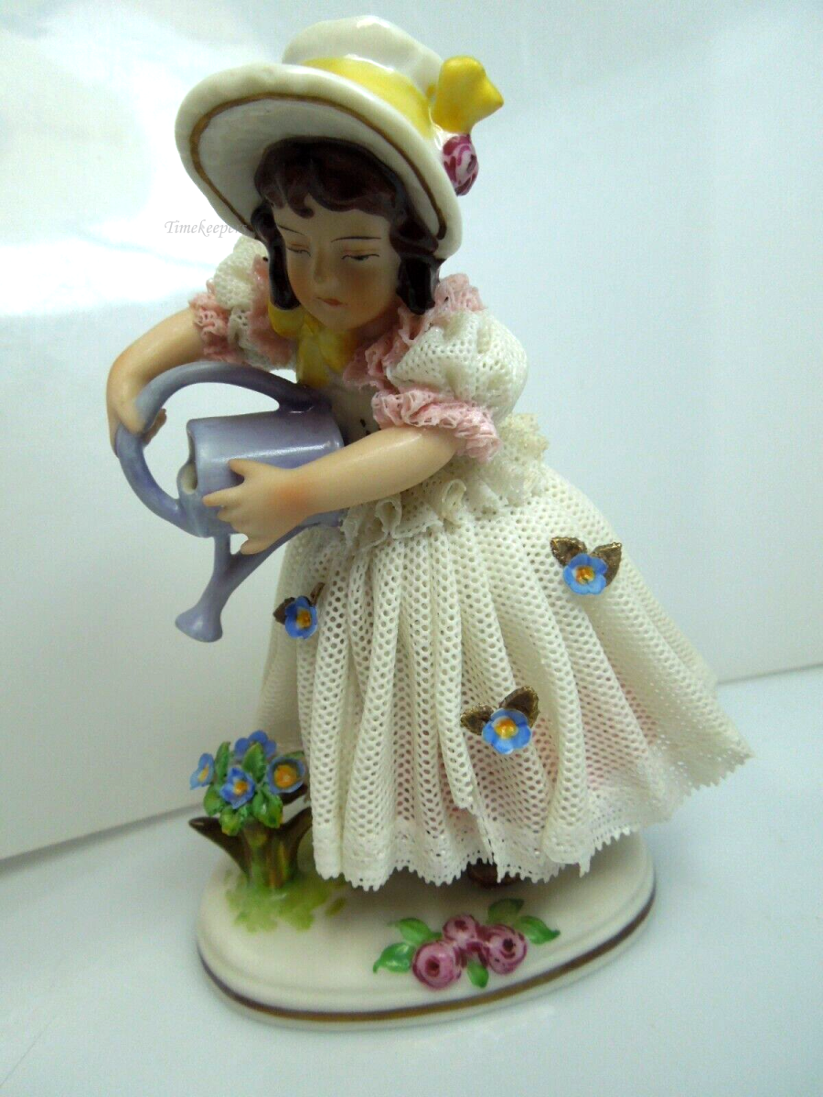 s797 Vintage Dresden German Continental Porcelain Figurine Girl in Lace Trim Dress Pouring water 