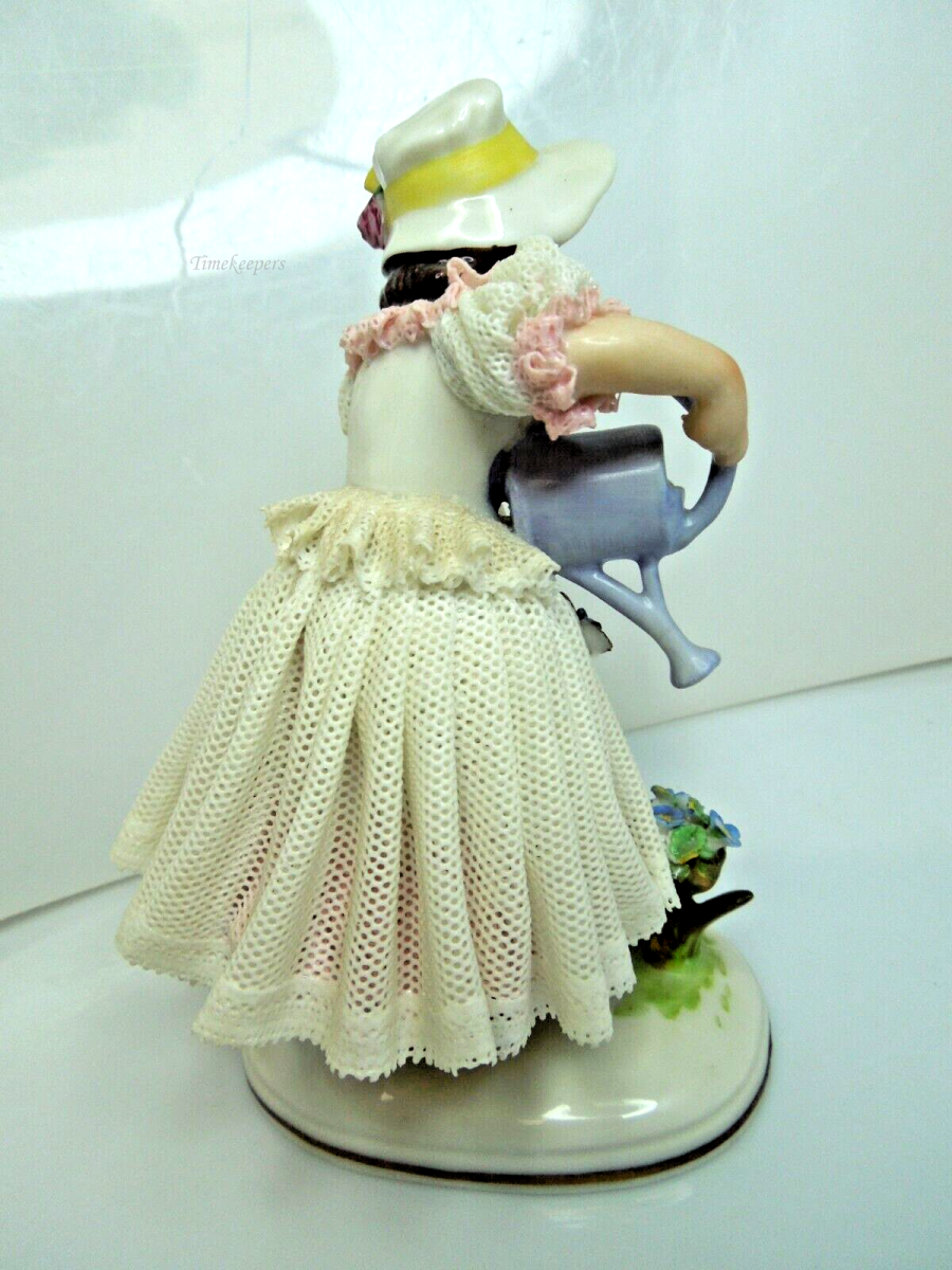 s797 Vintage Dresden German Continental Porcelain Figurine Girl in Lace Trim Dress Pouring water 