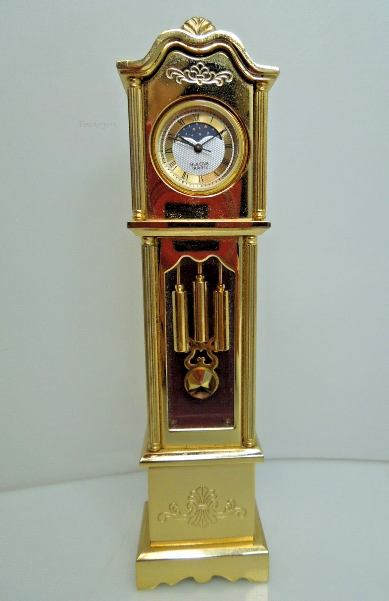 t013 Bulova Quartz Miniature Gold tone Grandfather Miniature Clock 4 3/4" tall