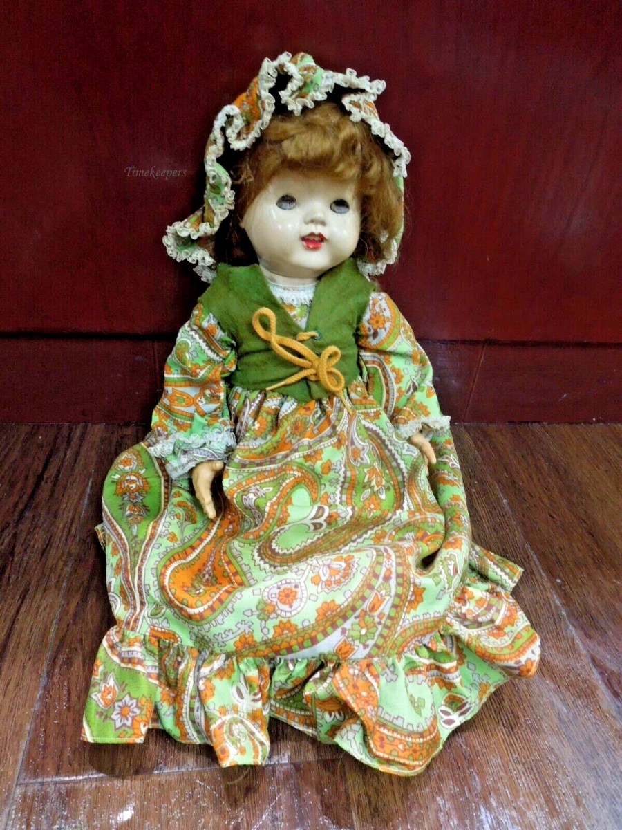 s700 Vintage Impco Hard Plastic Doll with original Dress