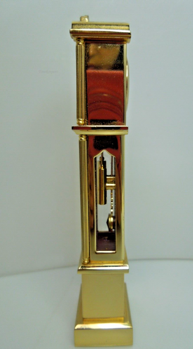 t013 Bulova Quartz Miniature Gold tone Grandfather Miniature Clock 4 3/4" tall