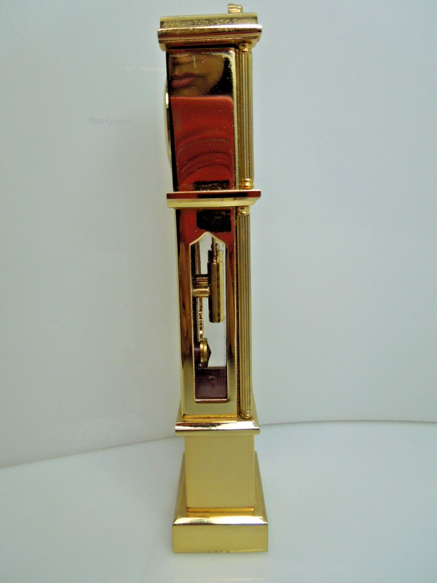 t013 Bulova Quartz Miniature Gold tone Grandfather Miniature Clock 4 3/4" tall