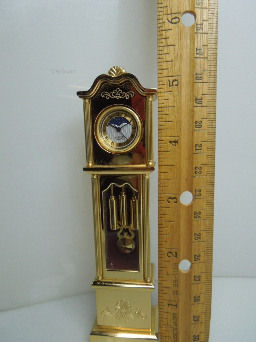 t013 Bulova Quartz Miniature Gold tone Grandfather Miniature Clock 4 3/4" tall