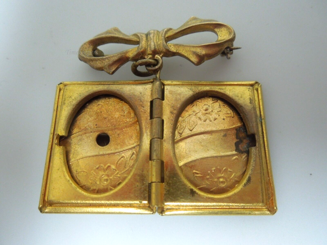 s332 Vintage Mid Century Bow with Dangling Book Shaped Locket Pin Brooch