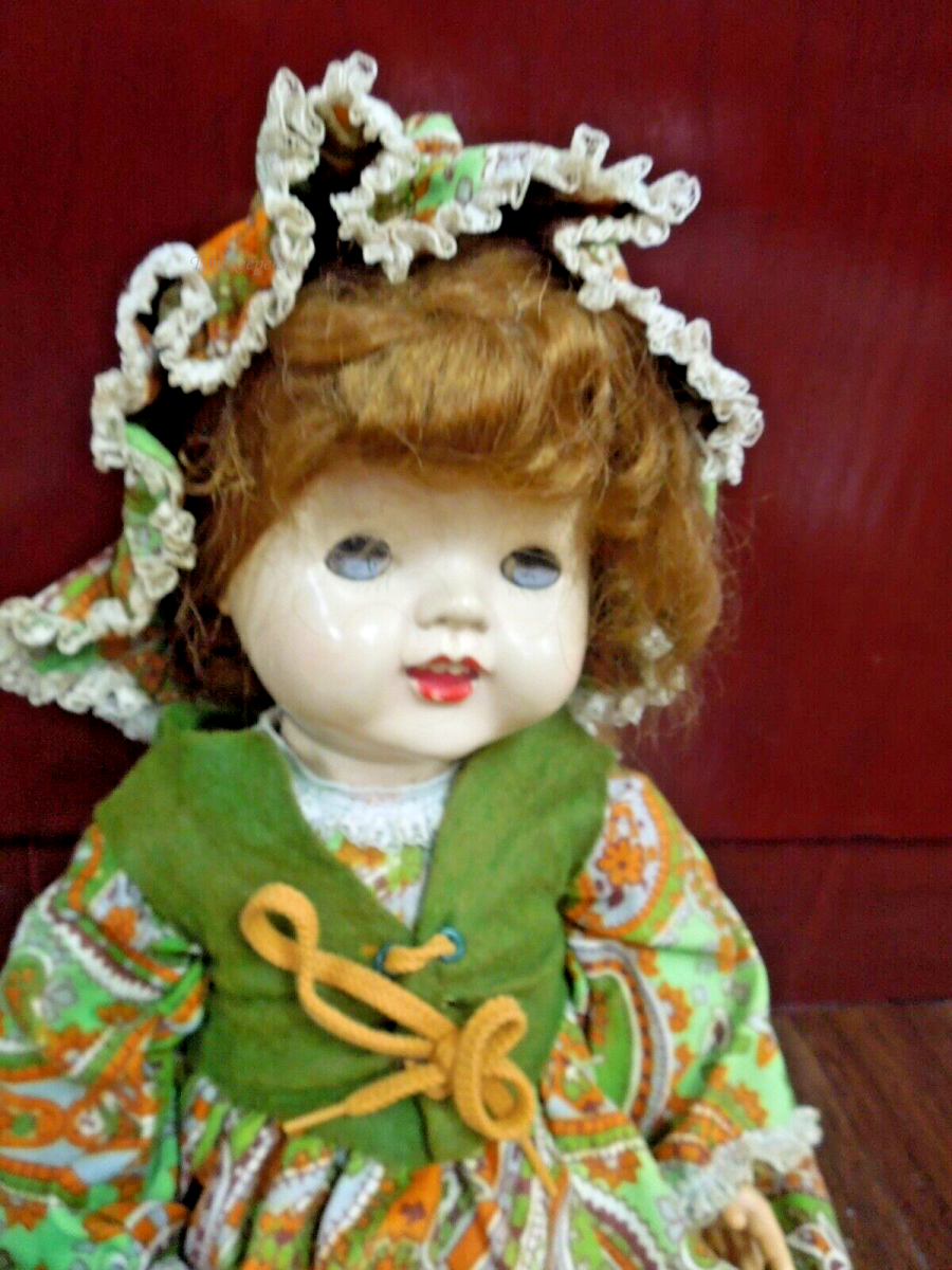 s700 Vintage Impco Hard Plastic Doll with original Dress